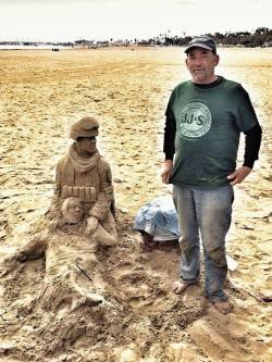 cleared-hot:  This homeless veteran was a mortarman, and now spends every day building sand sculptures near the Santa Barbara pier. He says this sculpture was a medic treating a wounded soldier. 