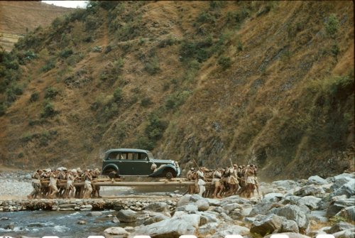 historicaltimes: Nepali men carrying the 1938 Mercedes Benz that Adolf Hitler gifted to King Truibhu