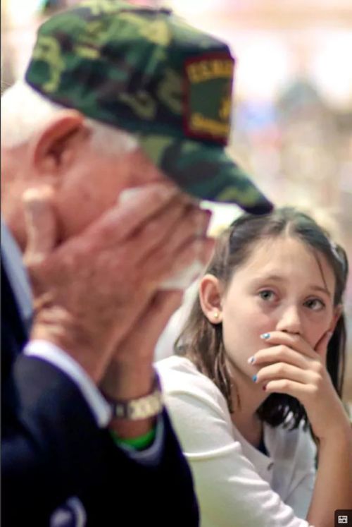 blondebrainpower:A granddaughter witnesses her grandfather break down at her schools Veterans Day assembly.