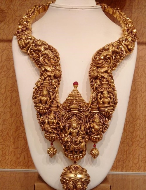 Gold necklace with Shiva family and others deities