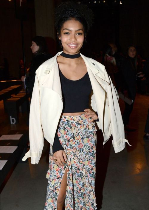 celebsofcolor:Yara Shahidi attends Topshop’s London Fashion Week show at Tate Modern on February 19,