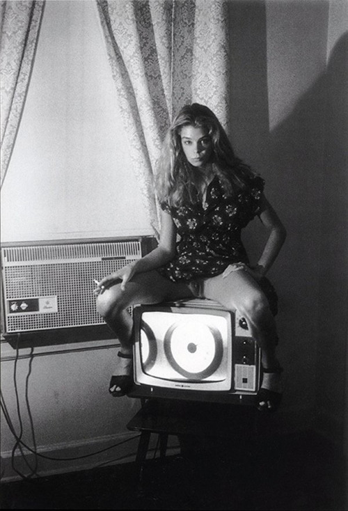 the-night-picture-collector: Helmut Newton, Kristin Bell sitting on TV Set, 1976