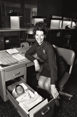 Abandoned baby sleeping in desk drawer at Los Angeles Police station, 1971.