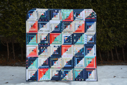 Scrappy Log Cabin Quilt: Finished!A couple weeks back, I finished the last stitches on binding my sc