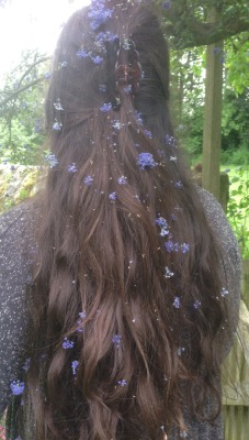 walking-sulha:my sister put blossom in my hair today. i must admit that it looks nice