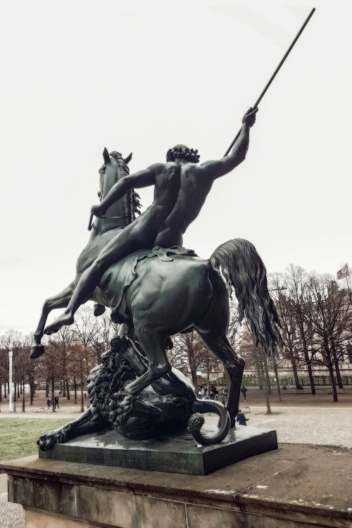 A statue of The Lion Fighter at the entrance of Altes Museum in Berlin, Germany.