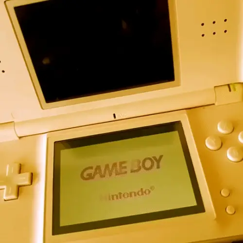 A yellow nintendo ds booting up a gameboy advance game