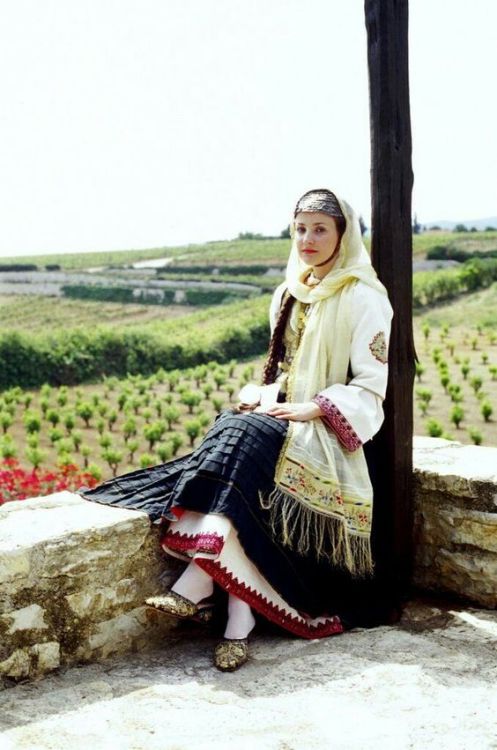 A girl from Megara, wearing the traditional dress. 