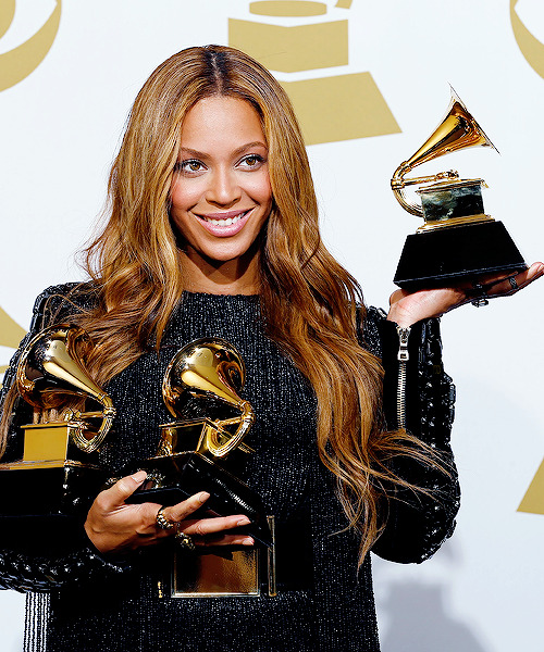 ikonicgif: Beyonce holds the awards she won for Best R&amp;B  Performance and