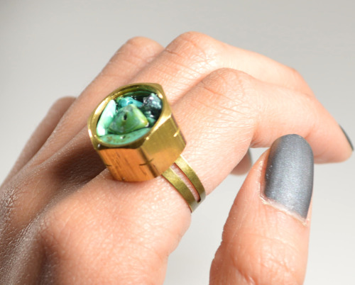 DIY Hardware Store Stone Chip RIng Tutorial from Studs and Pearls here. It looks like she uses resin