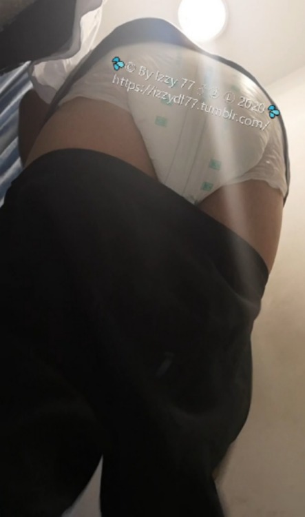 izzydl77: Trying some new summer shorts in store while wearing my pampers. The white shorts shows my