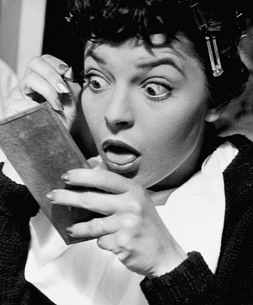 Anne Bancroft doing her makeup for her role in The Girl in Black Stockings, c. 1956. 