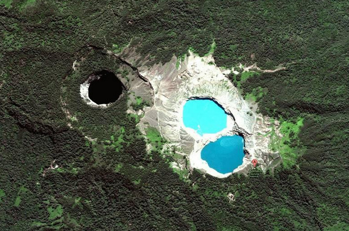 The three crater lakes of Kelimutu volcano in Indonesia are seen in a satellite photo.