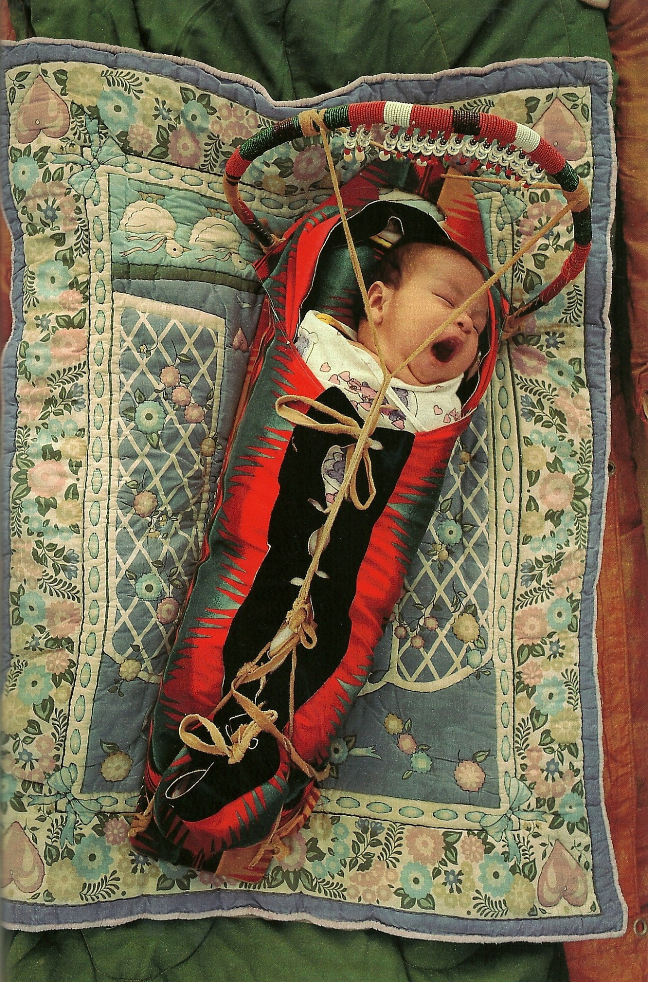 vintagenatgeographic:
“ Native American baby in a cradle board at the annual powwow in White Swan, Washington
National Geographic | June 1994
”