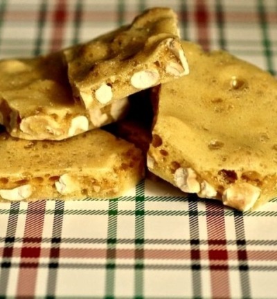 Recipe for Peanut Brittle
My Aunt Joyce taught my mother how to make this and she taught me. ½ cup water, 1 cup white sugar, 1 cup raw Spanish peanuts, 1 teaspoon baking soda, ½ cup light corn syrup