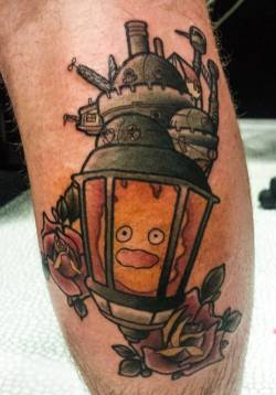 fuckyeahtattoos:  My amazing little Calcifer in a pop culture twist on a traditional lantern design. Done by the ever incredible Brock Fidow of Auckland, New Zealand!