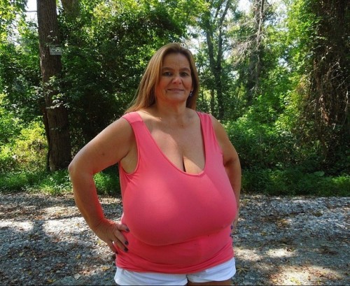 Wonderful woman with truly beautiful tits. adult photos