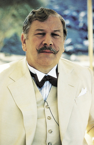 Flammentanz — Peter Ustinov as Hercule Poirot in “Death on the...