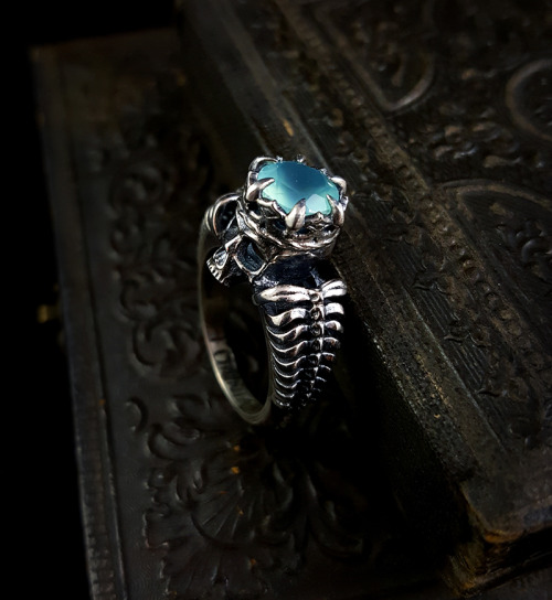 Arcana II ring with glowing sea green chalcedony.