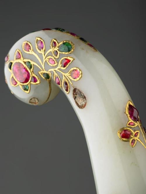 art-of-swords:  Mughal Dagger Dated: 17th century - 18th century Culture: North India Medium: Jade, steel, gold and cabachon rubies and emeralds Measuremenrs: Length: 24.1 cm, blade Unknown Artist / Maker  Source & Copyright: The Wallace Collection