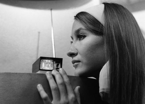 atomic-flash:  The  Sinclair Microvision set - a portable TV designed by  Clive Sinclair that could go anywhere and claimed to be the world’s  smallest television. Earl’s Court, London, 1 September 1966. The cathode ray tube set had a diagonal of