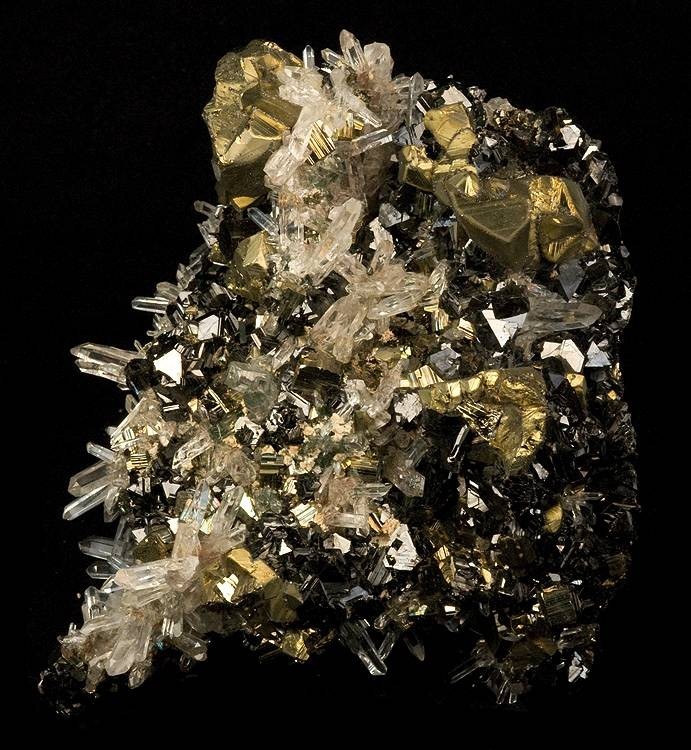 fuckyeahmineralogy:  Chalcopyrite and quartz on sphalerite, Alimon Mine, Peru.  Chalcopyrite