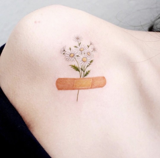 Minimalist Flower & Band Aid Tattoo