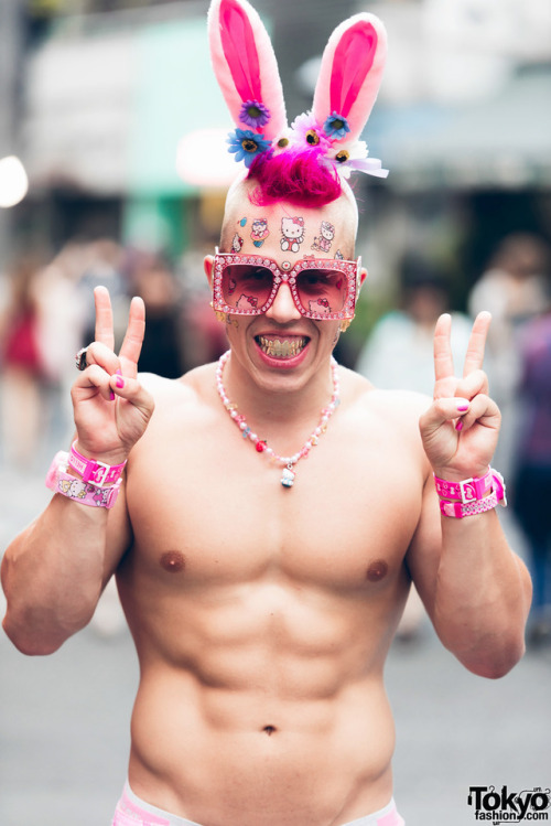 Austrian performance artist Candy Ken on the street in Harajuku wearing pink Hello Kitty fashion, bu