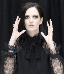 evagreennews:   Eva Green puts on a very Victorian display in lace  high-necked blouse at Miss Peregrine’s Home for Peculiar Children  photocall in London. 