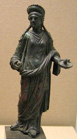 Hygeia, the deity in charge of good health, wears a headdress with fillets with a snake on her right