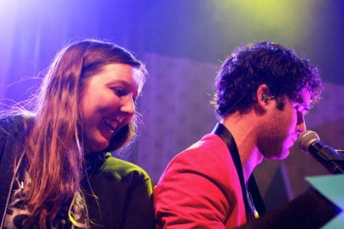 Darren Criss with a fan on stage in concert at The Fillmore in San Francisco, CA