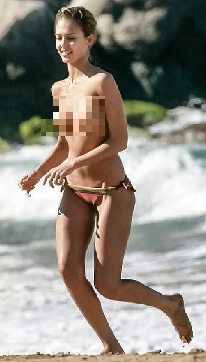 blurry-porn:  Jessica Alba topless on the beach.