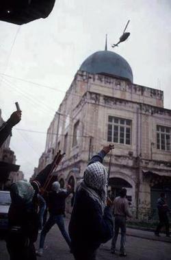 brownriot:  Palestinian youth uses a sling