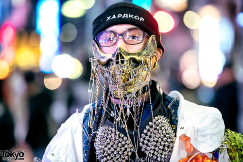 17-year-old Japanese high school student Kanji on the street in Harajuku wearing a mostly handmade a