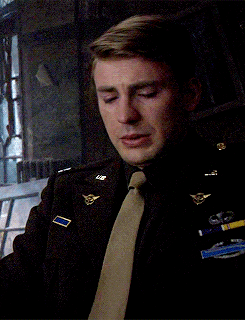 theirtinywings:   casspeach:  gotham:  Steve crying after Bucky fell  What I love about this, is that this isn’t Hollywood crying ™. This isn’t the single perfect manly tear of the hero, or the over the top Noooooooooo!!!! This is real, ugly, in