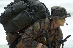 militaryarmament:  Marines assigned to 3rd Marine Division, III Marine Expeditionary Force arrives at Bellows Beach for a beach assault exercise during Rim of the Pacific Exercise 2014. July 27, 2014.