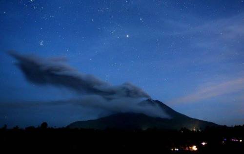 Sinabung This image shows a fairly quiet Sinabung volcano on the Indonesian Island of Sumatra oozing