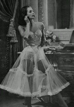 petticoatpower:  This is a classic vintage petticoat photo, and the rest of her lingerie is very pretty as well. 