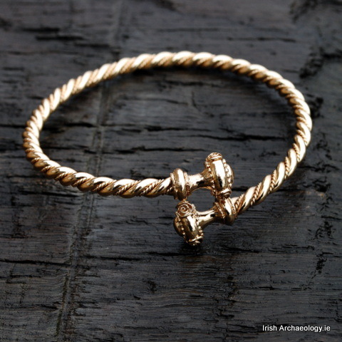 Fashioned out of bronze, this distinctive bracelet is inspired by prehistoric gold torcs. Gold torcs