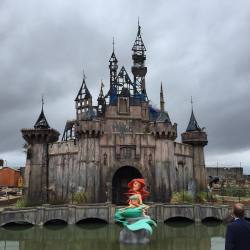 culturenlifestyle:  Inside Banksy’s Alternative and Grim Version of Disneyland Welcome to Dismaland, where life isn’t always a fairy tale! Located at the seaside resort of Weston super Mare in the UK, Dismaland is a sinister, dystopian and less glamorous