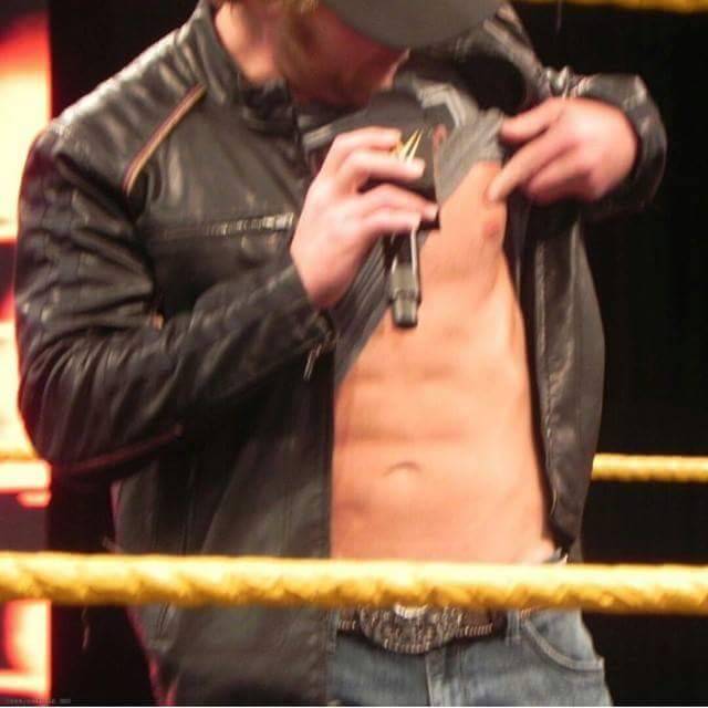 ….why does he wrestle in a shirt?!! 