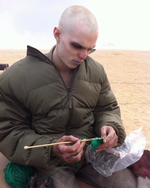 fckyeahhoult:“@NicholasHoult Trying to get work done on #furyroad set #knitlife w