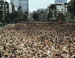 bloggingforkaren:  Found this photo in one of my friend’s host family’s apartment. 5,000 Chileans posing nude in Santiago Centro for Spencer Tunick in 2002. 