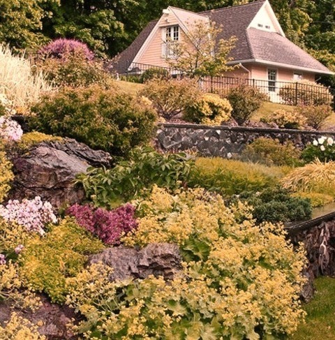 Ideas For A Sizable Victorian Backyard With Concrete Pavers And Full Sun.