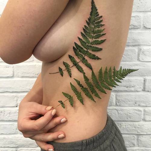 tattoofilter: Realistic fern tattoo on the side. Tattoo artist: Rit Kit