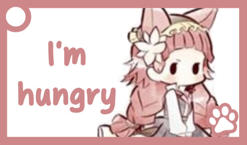 A red communication card of Lucy. The text reads: 'I'm hungry'