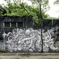 jamesjeanart:  Paradise. Housepaint, Lacquer, Spraypaint, and Oil on Concrete, 43’ x 17’, 2014.   Mural for @powwowtaiwan at the Taipei Zoo. Taiwanese macaques tumble in a paradise/prison of man’s making. Photo: @bshigeta