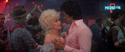 some sylvester stallone & dolly parton looks from rhinestone (1984)