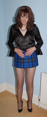 samanthasatinesworld:  another sexy sissy shot..legs om show..fishnets too…patent heels..miniskirted..satin topped…cum on feel the tart..take and enjoy..yours for the asking..taking…using…abusing…bound to please…   make,it your life