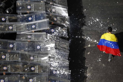 lefilmnoir:  Venezuela’s Riot 12F  PLEASE REBLOG!!! THE MEDIA IN VENEZUELA IS BEING CONTROLLED BY THE GOVERNMENT AND THEY ARE NOT SHOWING THE PEOPLE WHATS HAPPENING, THEY ARE SENDING THE POLICE AND THE ARMY TO SHOOT THE PEOPLE, THE ONLY WAY WE CAN FIND